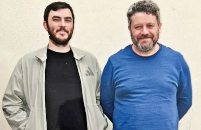 An Associate Professor and a journalist in the courtyard